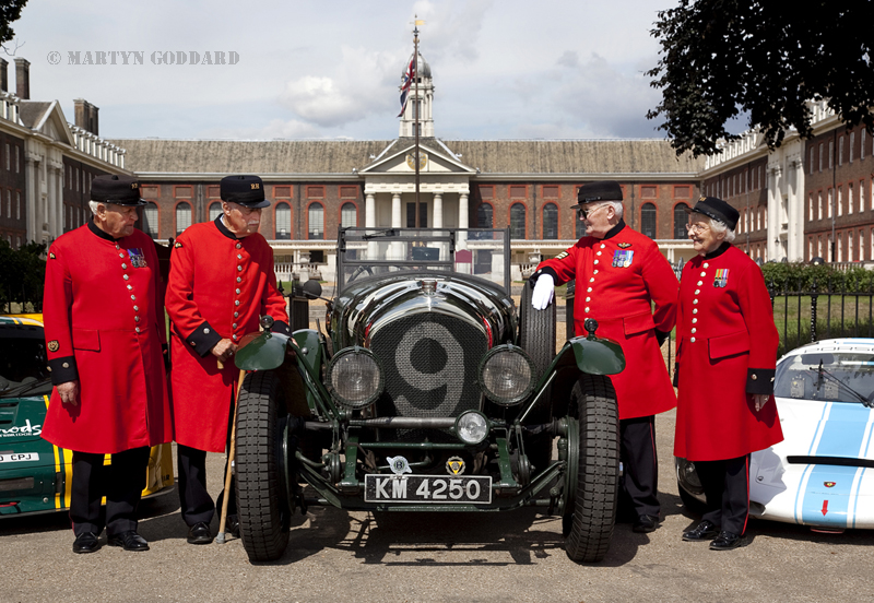 Chelsea Pensioners take a look at a Vintage Bentley Le Mans car in the grounds of the Royal hospital.